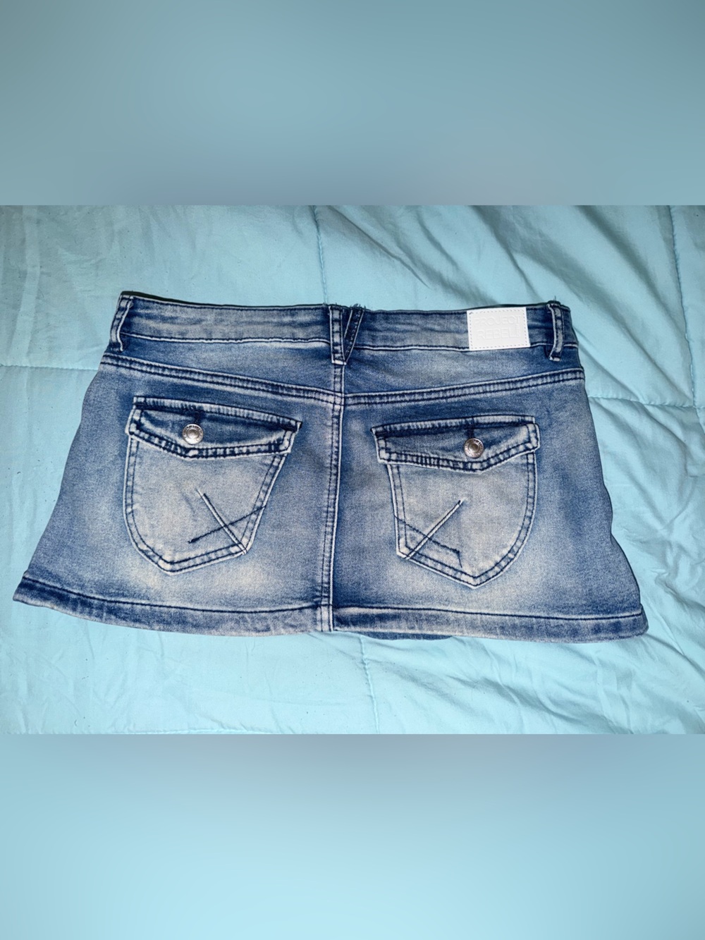 Classic Light Blue Denim Mini Skirt with Back Pocket Detail